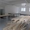 Ausstellungsaufbau - Tag 1: Das Holz ist angeliefert worden, es wird wieder gesägt, gebohrt und geschraubt.